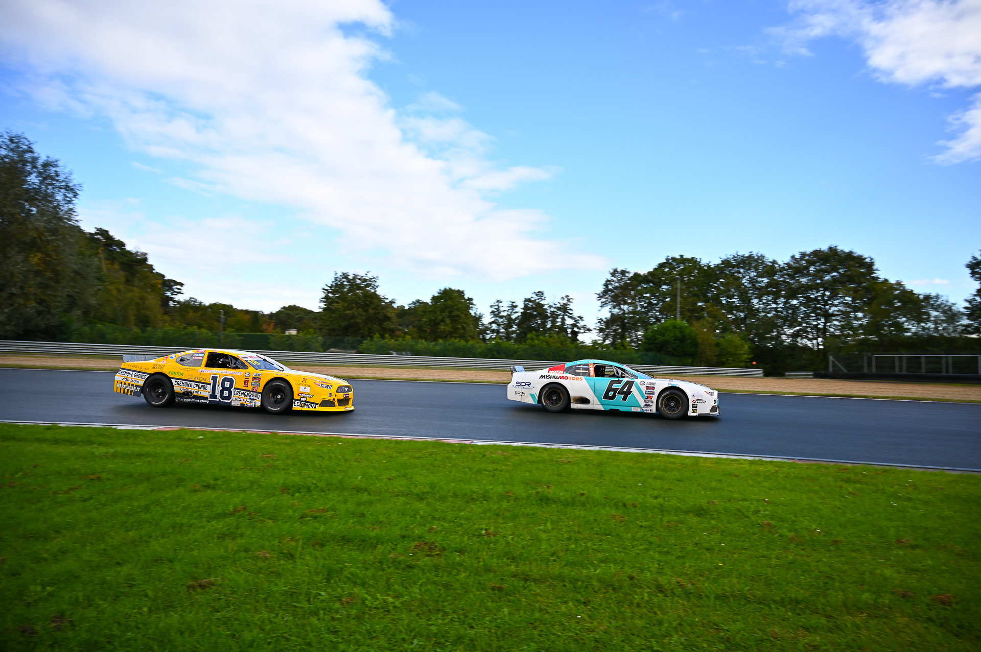 Giorgio Maggi (#18) races Lucas Lasserre (#64) during the 2023 EuroNASCAR Finals. In 2025, Maggi will race for Lasserre's SpeedHouse outfit