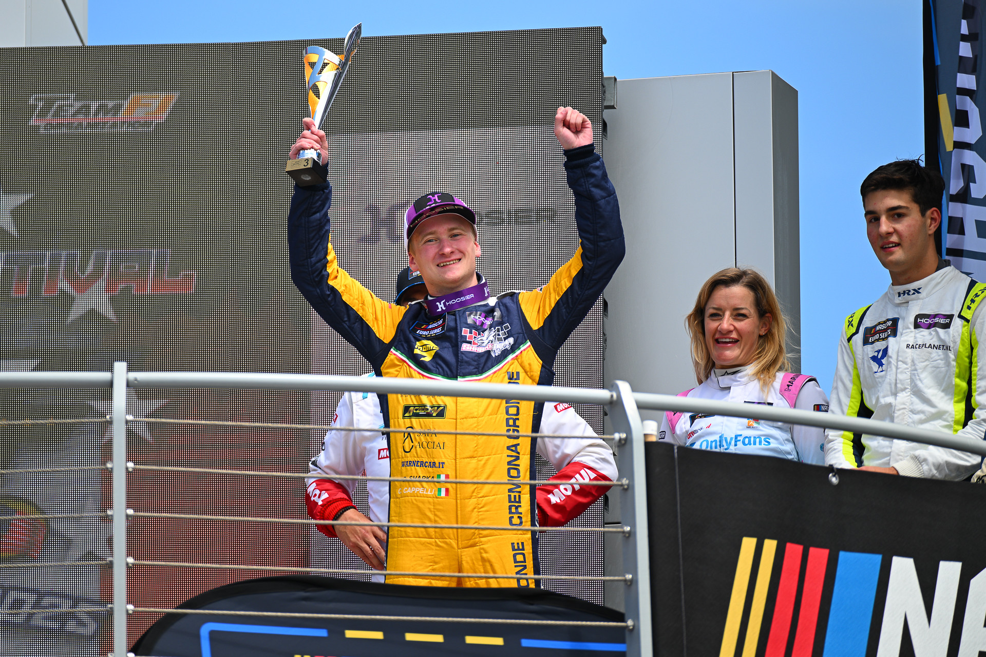 Daniil Shapka lifts his trophy after a top-3 finish in Rookie Challenge at Vallelunga