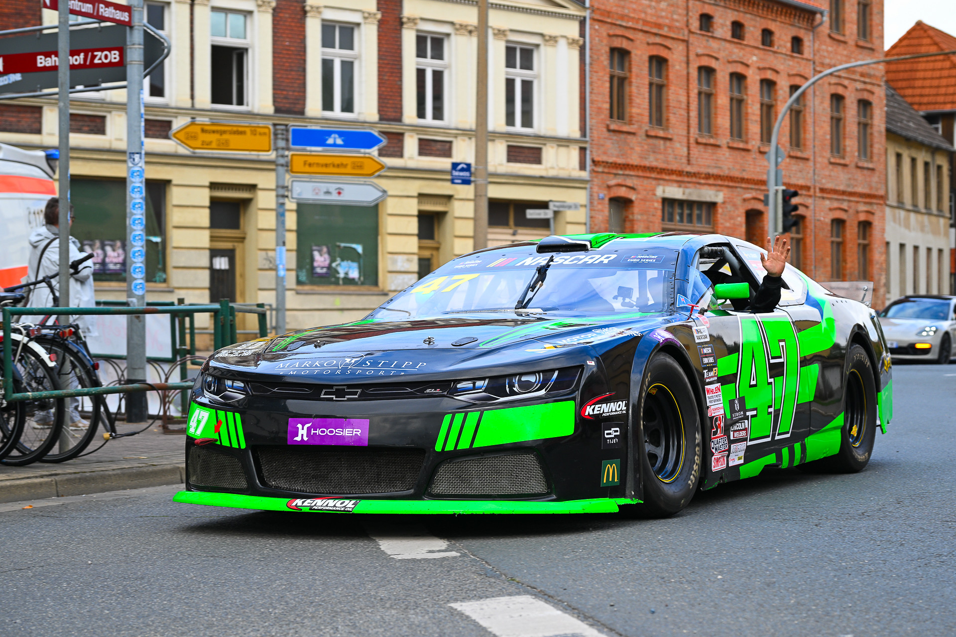 Marko Stipp Motorsport's #47 Chevrolet Camaro drives through the city center during the 2025 NASCAR GP Germany parade