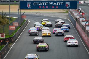 Cars raced through the front straight of Circuit Zolder, the home of EuroNASCAR Finals, during the 2025 finale
