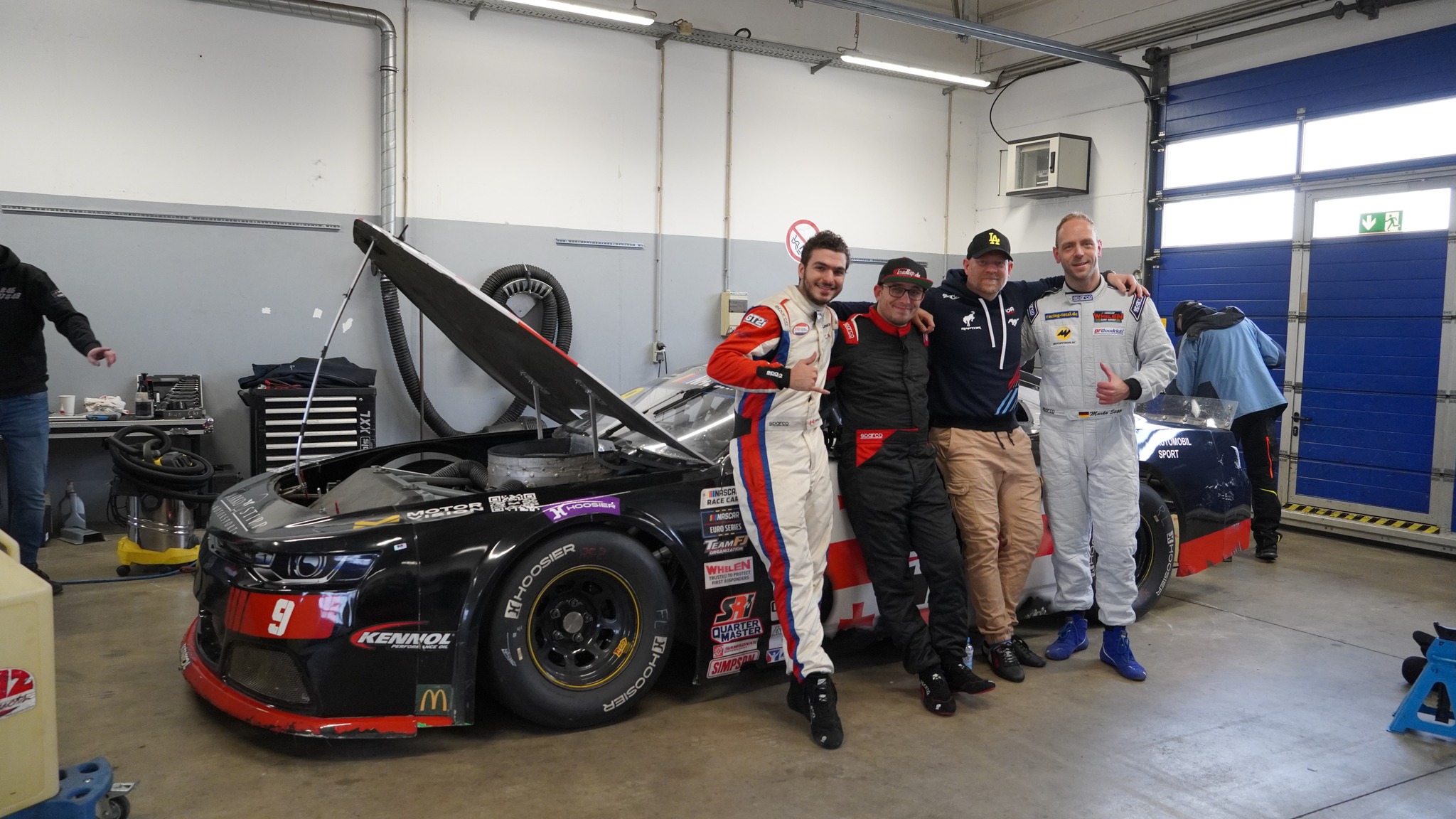 Thomas Pourrain (left), Andre Wiegold (center-left), Henrik Peters (center-right) and Marko Stipp (right) poses for a photo during Marko Stipp Motorsport's Discovery Day event