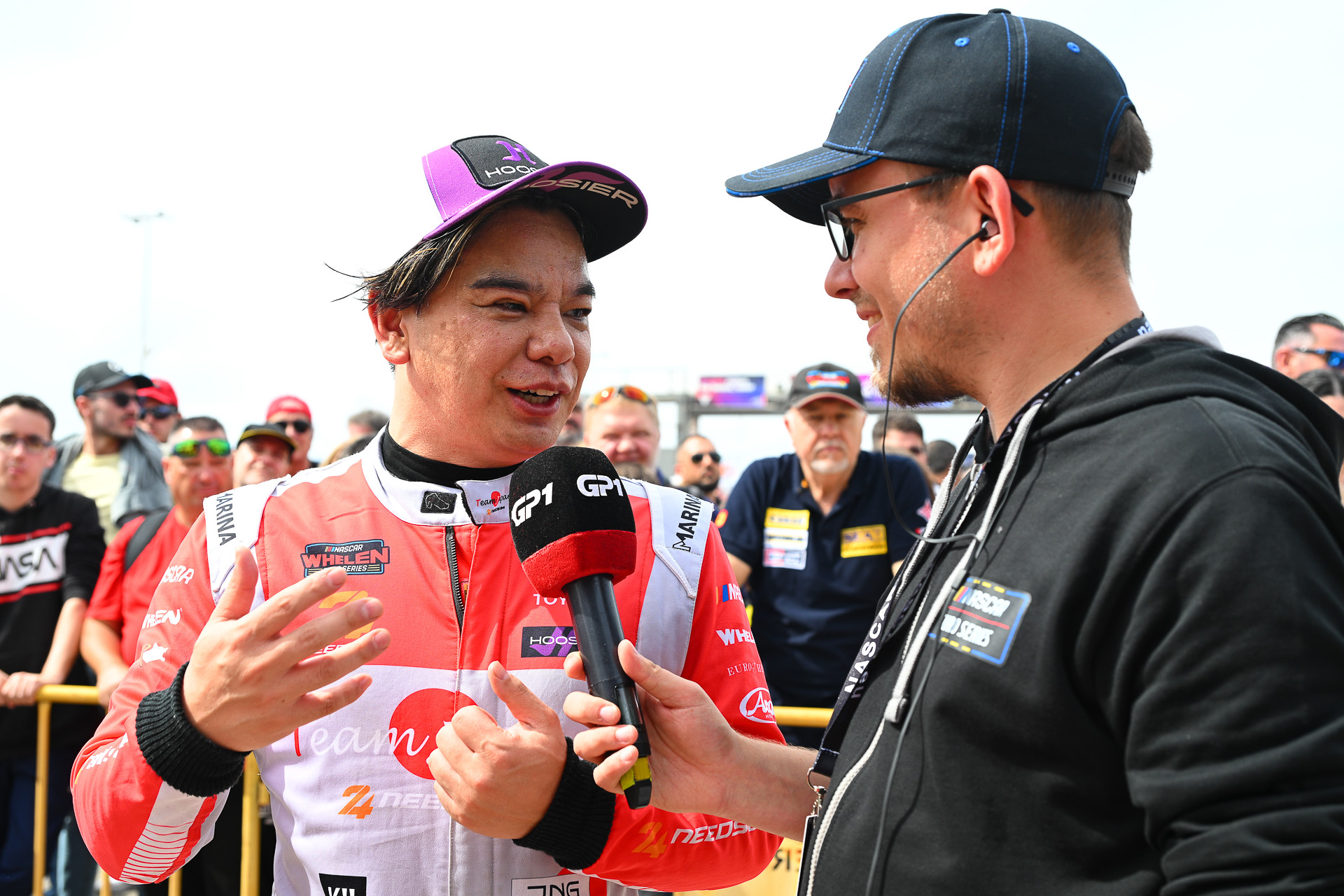 Kenko Miura speaks to Andre Wiegold after his podium finish in the 2025 Valencia NASCAR Fest at Circuit Ricardo Tormo