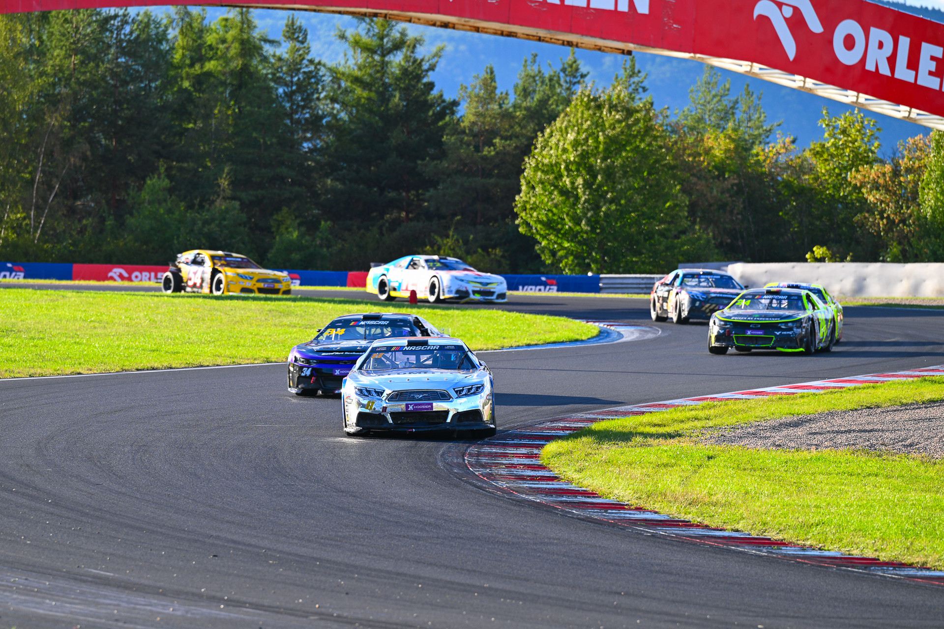 Raphaël Lessard (#11) keeps Thomas Toffel (#34) during the final restart of EuroNASCAR OPEN Race 1 at Autodrom Most
