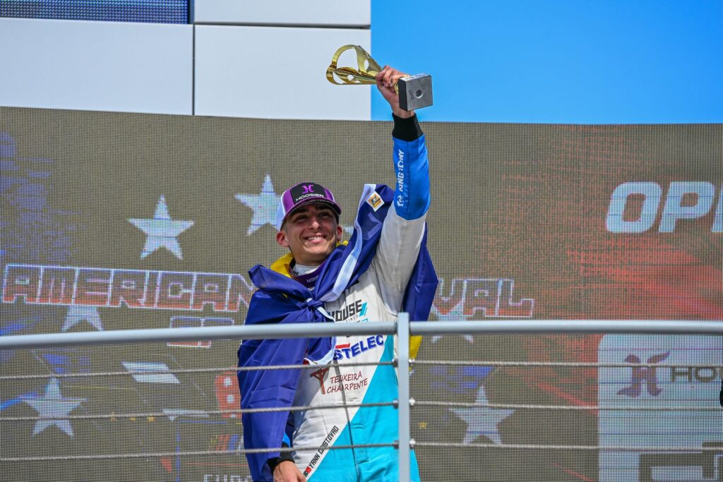 Yann Cristovao lifts up the winners trophy after he secured his first EuroNASCAR Rookie Challenge win at the 2026 NASCAR GP Italy
