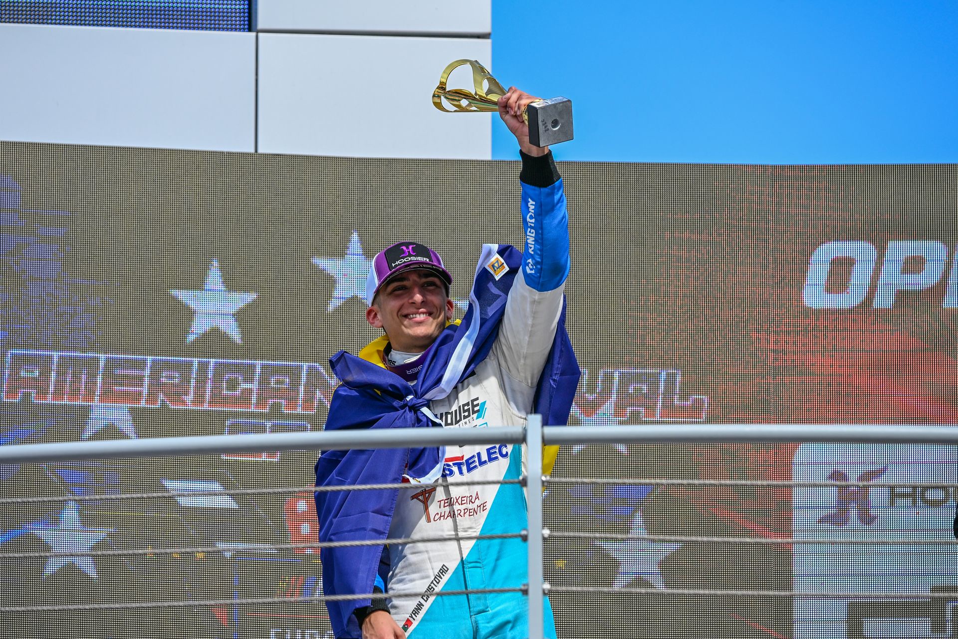 Yann Cristovao lifts up the winners trophy after he secured his first EuroNASCAR Rookie Challenge win at the 2026 NASCAR GP Italy