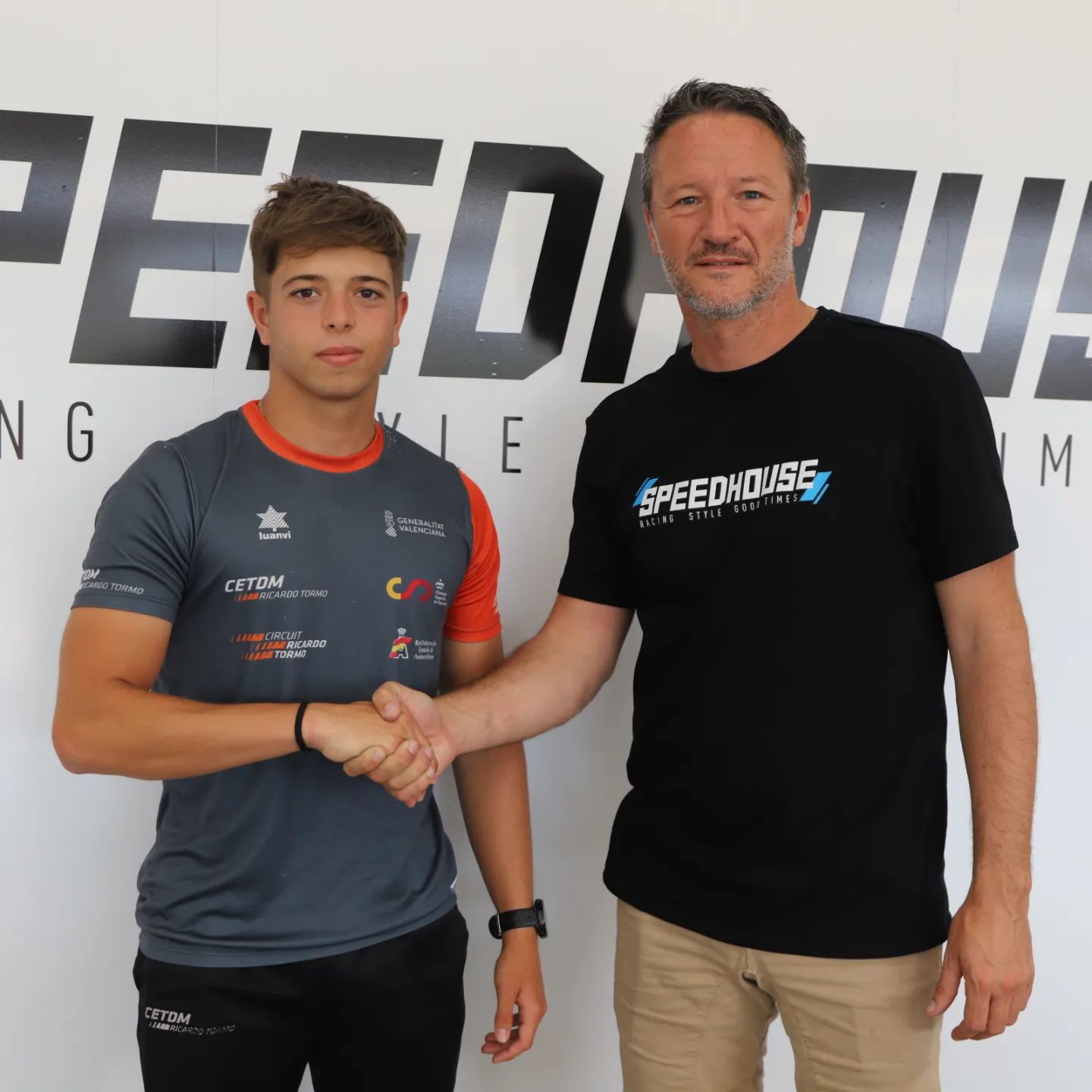 Dani Briz and Lucas Lasserre shakes hands during Briz's contract signing for the 2024 season