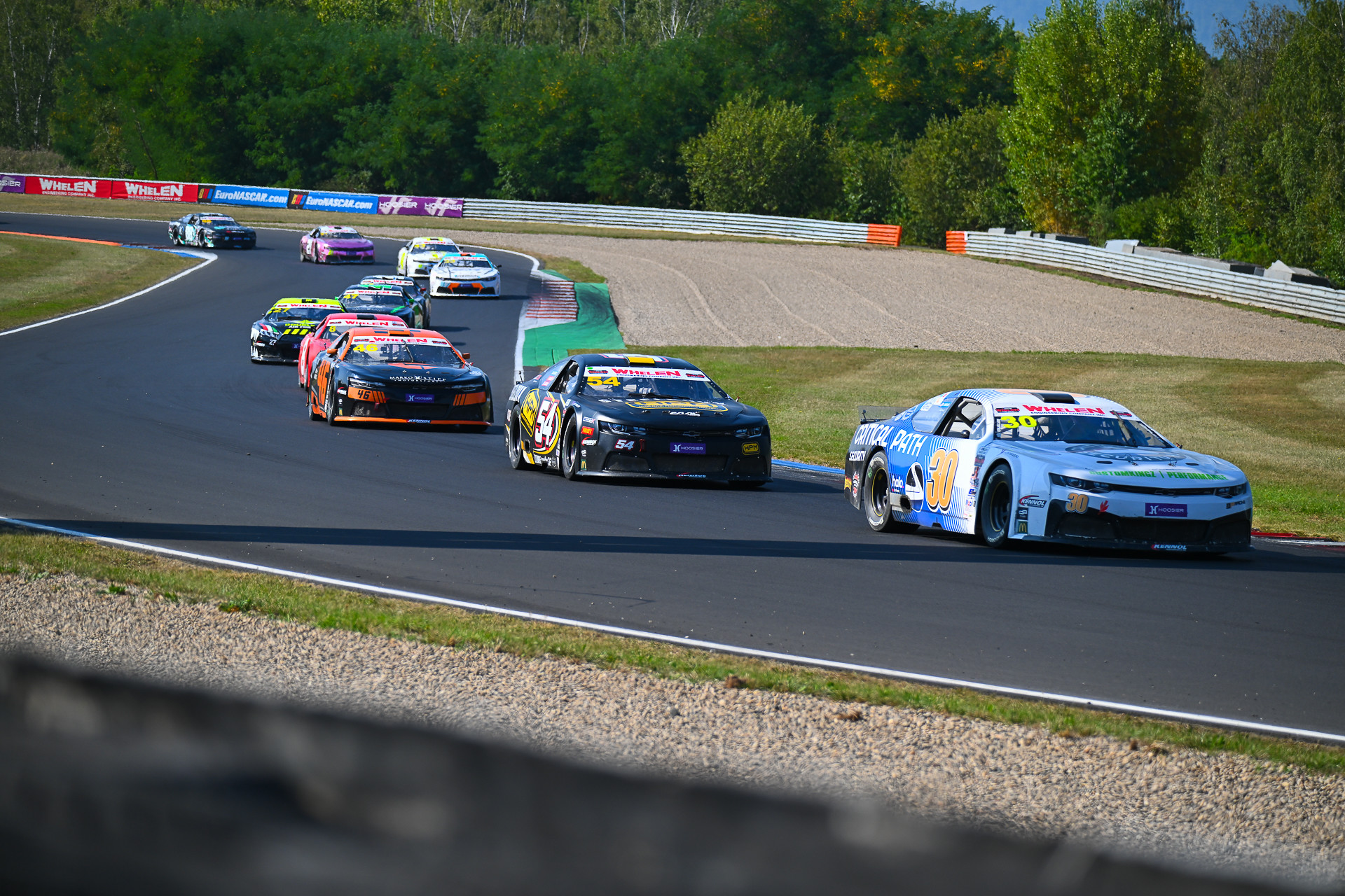 Ryan Vargas leads a pack of cars during the 2024 NASCAR GP Czech Republic at Autodrom Most