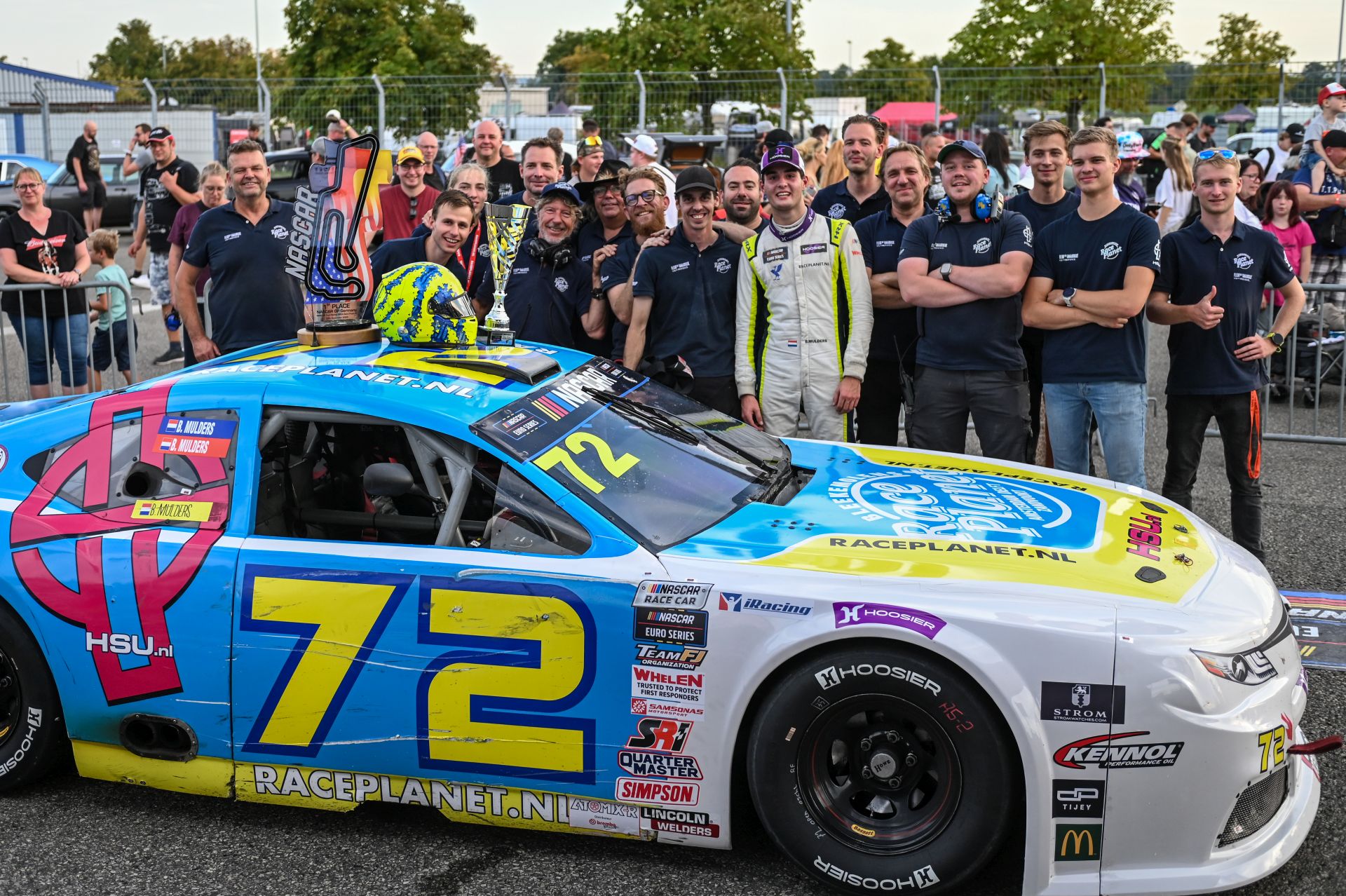 Bruno Mulders celebrates in Victory Lane with Team Bleekemolen members and his #72 Toyota Camry
