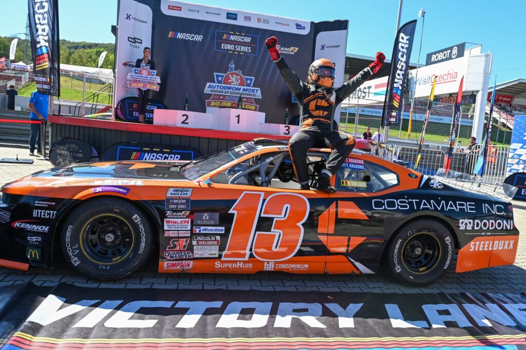 Thomas Krasonis celebrates in Victory Lane with his PK Carsport #13 Costamare Inc. Camaro at Autodrom Most in 2025