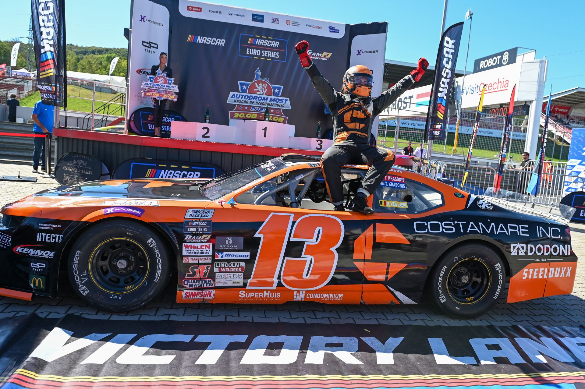 Thomas Krasonis celebrates in Victory Lane with his PK Carsport #13 Costamare Inc. Camaro at Autodrom Most in 2025