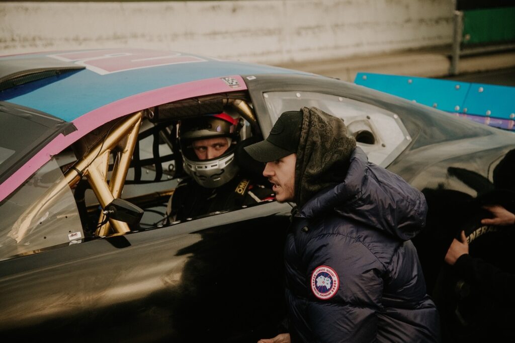 Jason Friday (in-car) is coached by Jack Davidson during Friday's first EuroNASCAR test at Fontenay in December 2025