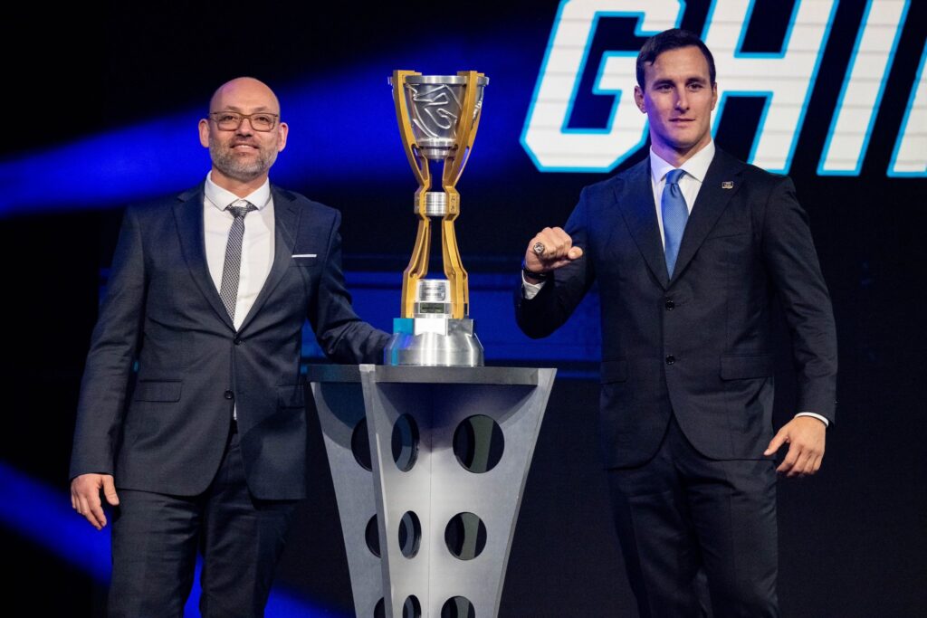 Vittorio Ghirelli poses with Jerome Galpin and his EuroNASCAR PRO championship trophy during the 2025 NASCAR Awards