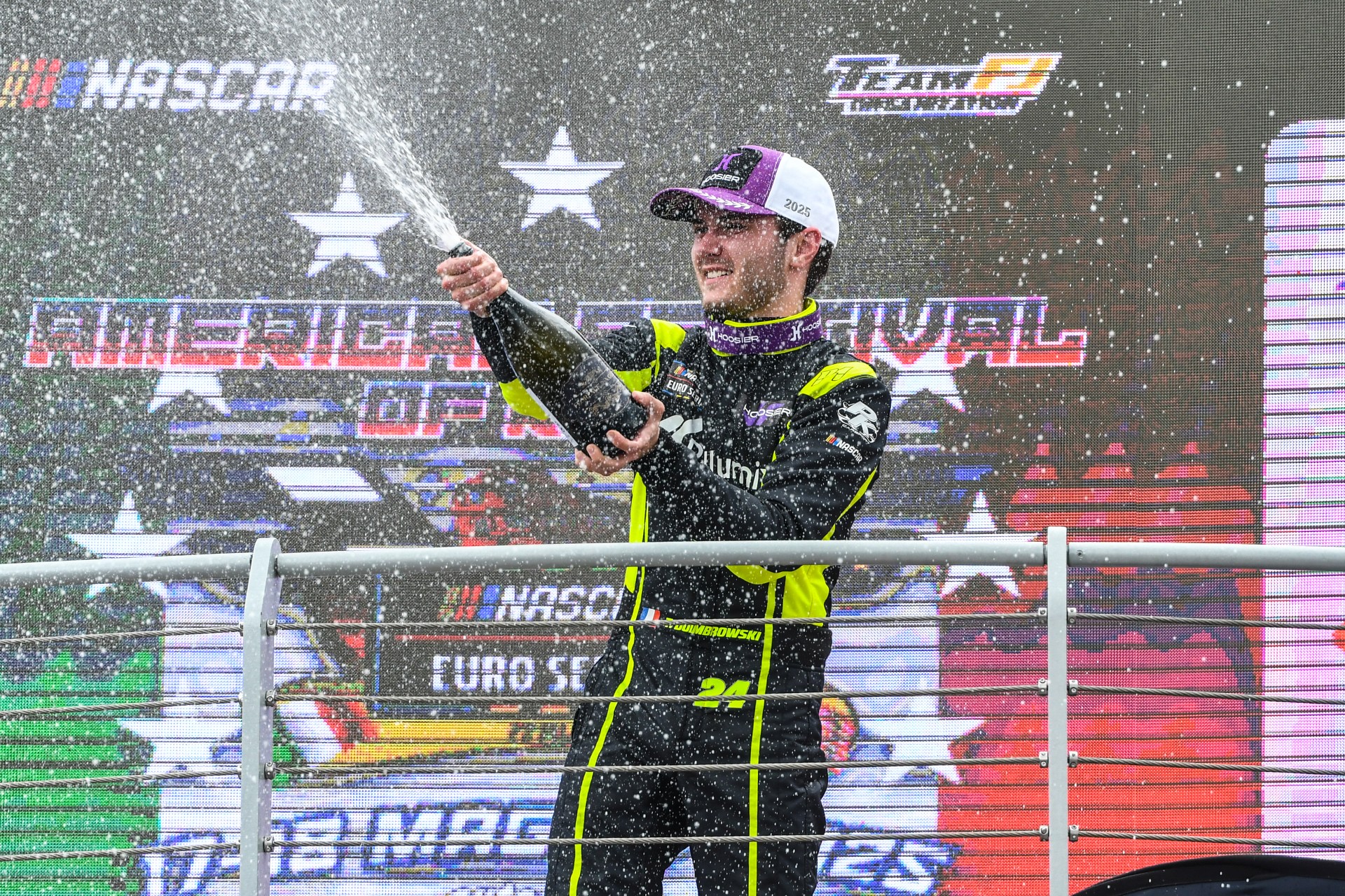 Thomas Dombrowski sprays the champagne after he scored his career best second place finish in the second Vallelunga race of 2025