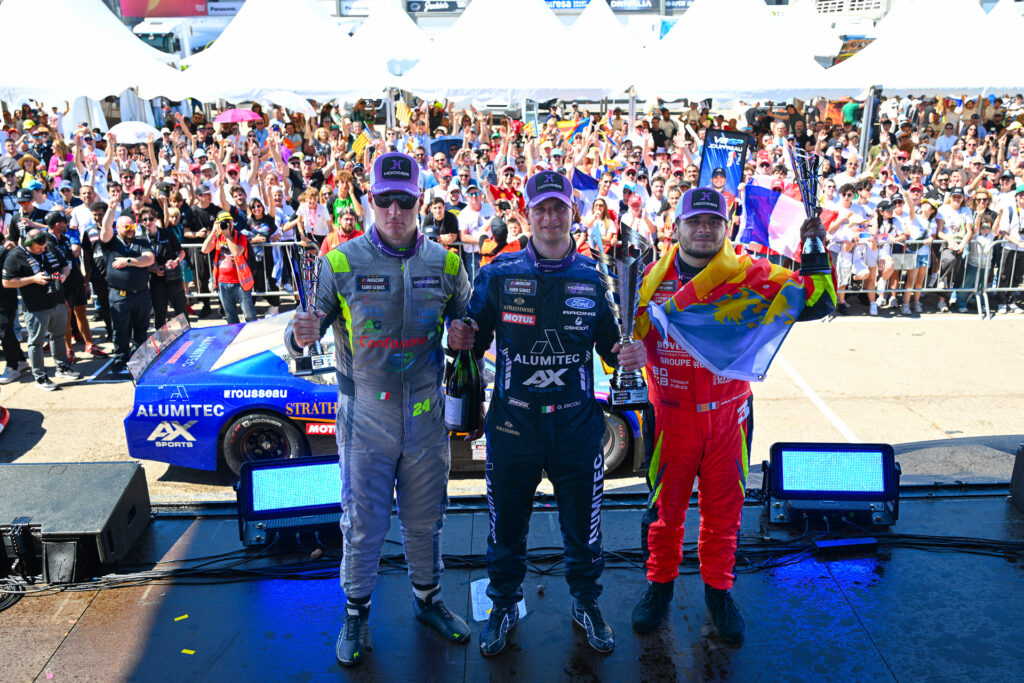 Gianmarco Ercoli (center) celebrates his first win in the V8GP era alongside podium finishers and title contenders Vittorio Ghirelli (left) and Paul Jouffreau (right)