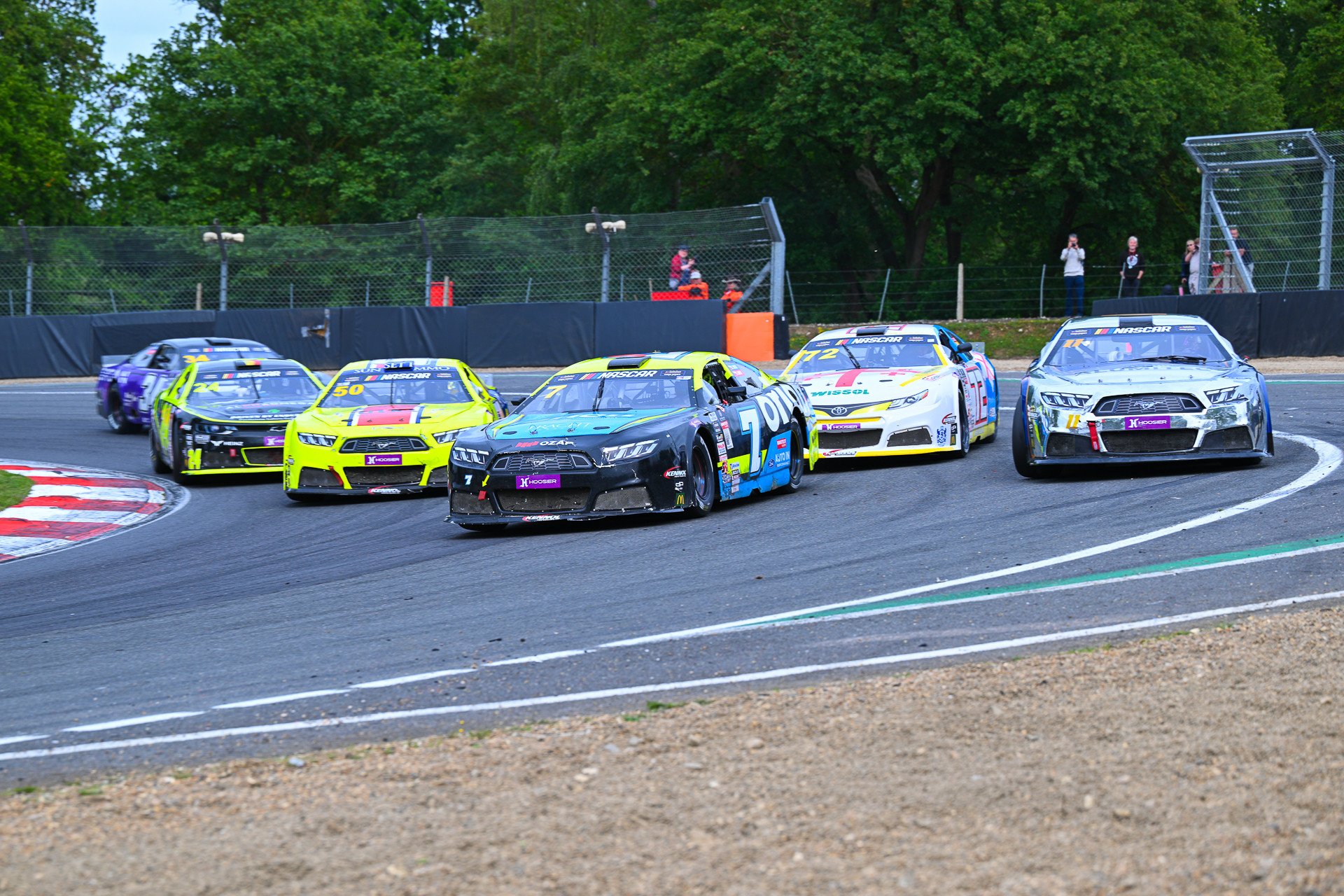 Martin Doubek (#7) goes past both Sandro Tavartkiladze (#72) and Raphaël Lessard (#11) to secure the EuroNASCAR OPEN sweep at Brands Hatch