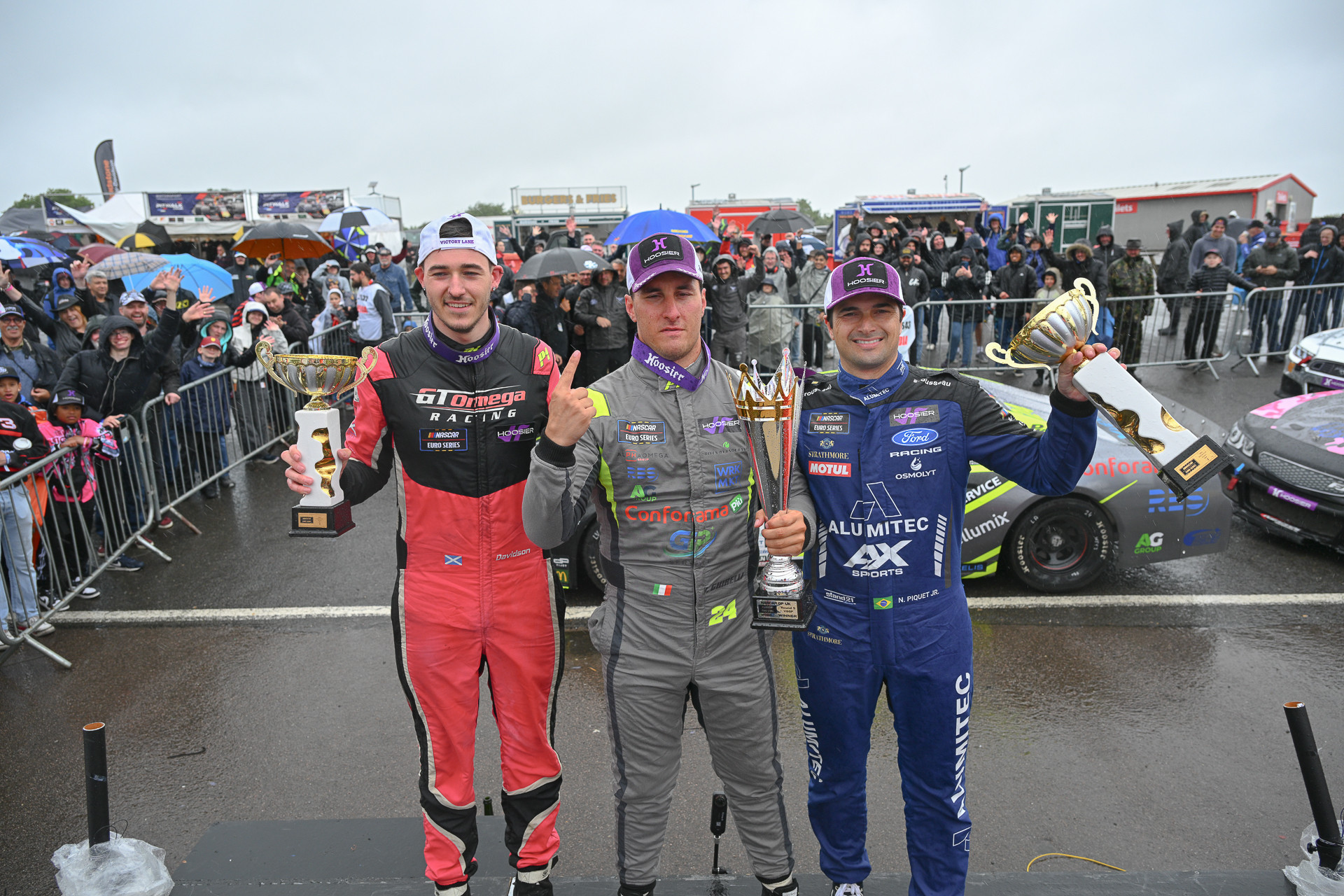 Vittorio Ghirelli (center), Nelson Piquet Jr. (right) and Jack Davidson (left) celebrated their top-3 finishes in the first EuroNASCAR V8GP race at Brands Hatch