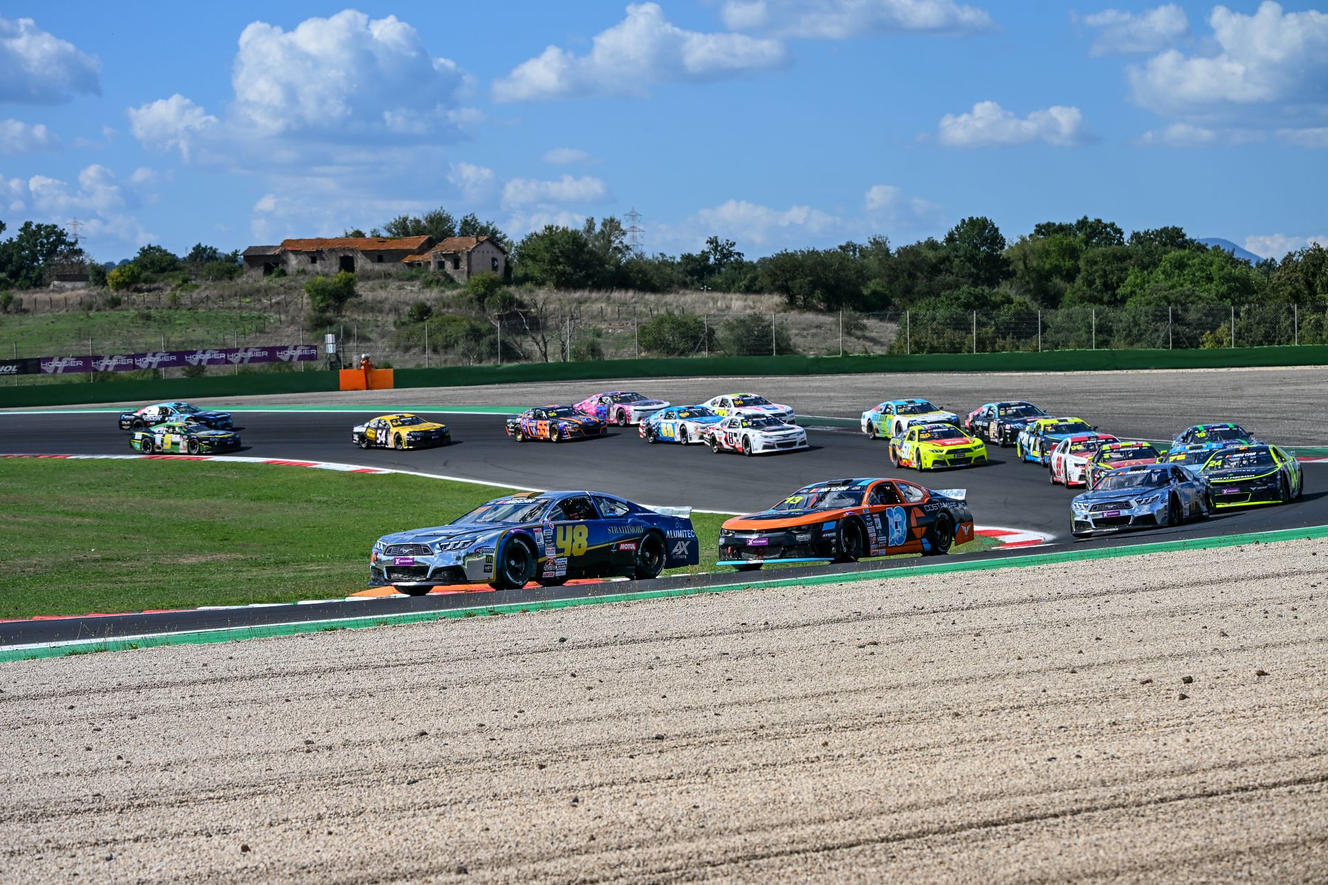 Nelson Piquet Jr. (#48) leads Thomas Krasonis (#13) and the field for the start of EuroNASCAR V8GP Race 2 at Autodromo Vallelunga