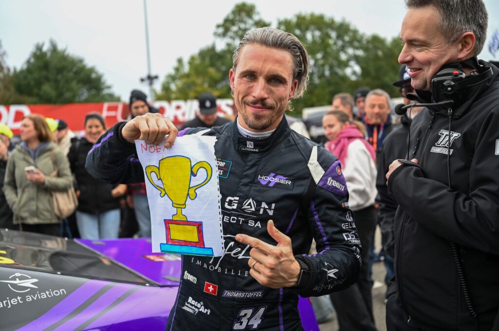 Thomas Toffel showcases the drawing of a trophy that was provided by his family after he clinched the 2026 EuroNASCAR OPEN title