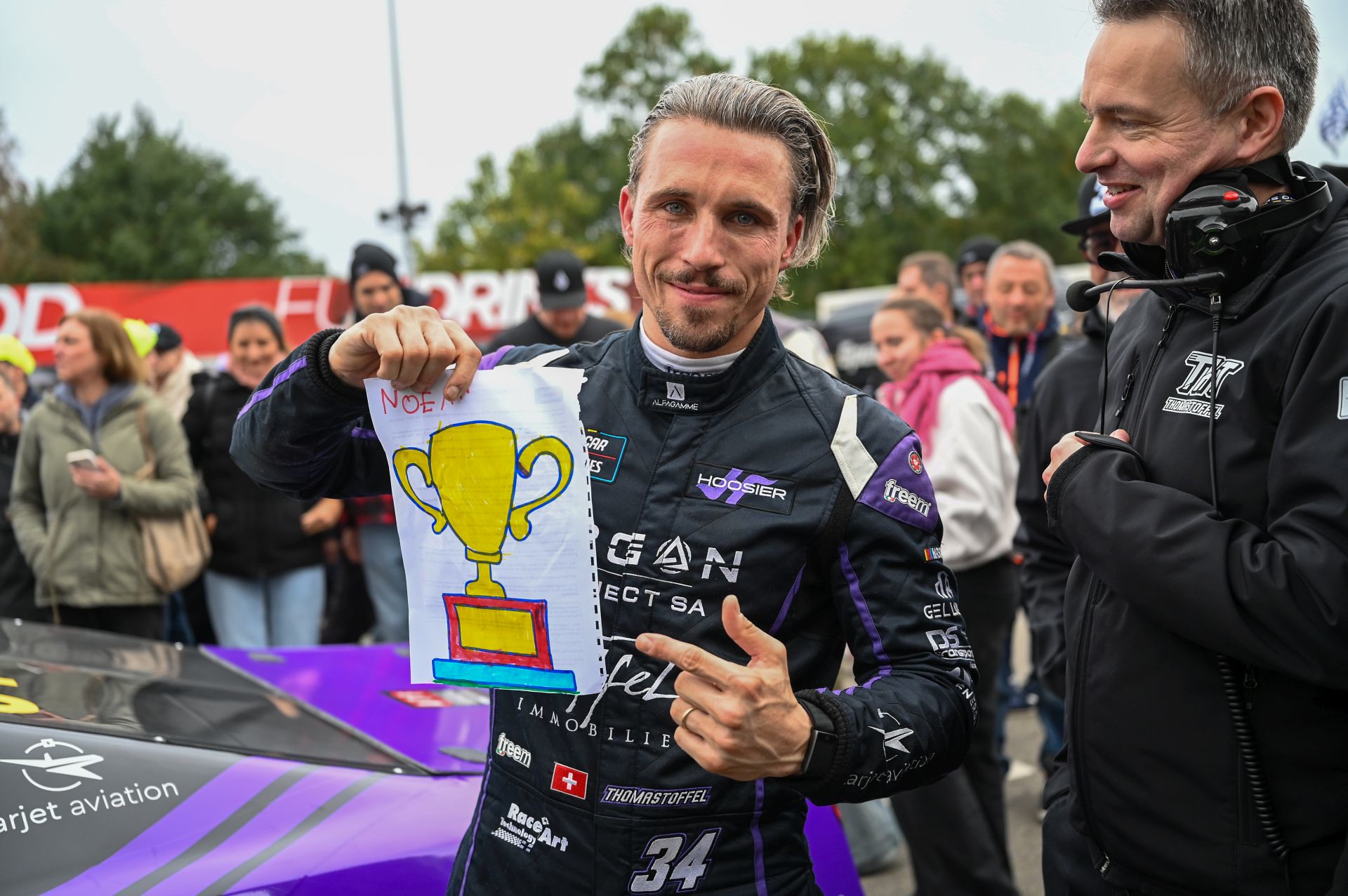 Thomas Toffel showcases the drawing of a trophy that was provided by his family after he clinched the 2026 EuroNASCAR OPEN title